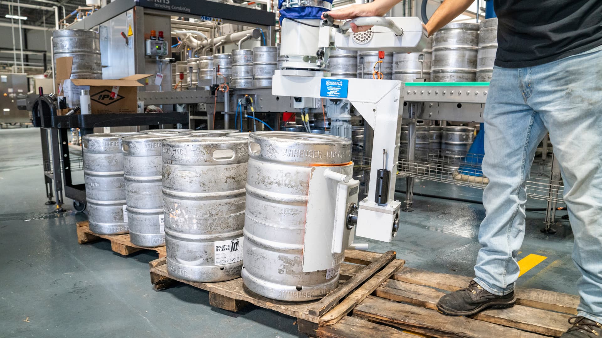 An image of kegs coming off the line at a brewery. 